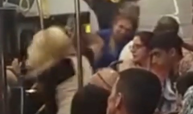 Otobüste saç saça baş başa kadın kavgası