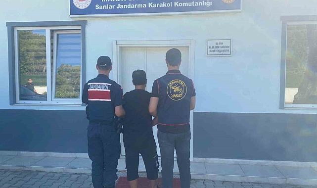 Kasten adam öldürme suçundan aranan şahıs oğlunun iş yerine yakalandı