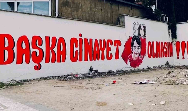 Azerbaycanlı ressam duvara "Başka cinayet olmasın" yazarak dilekte bulundu