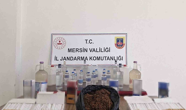 Mersin'de kaçak makaron ile sahte içki ele geçirilirken bir şüpheli de yakalandı