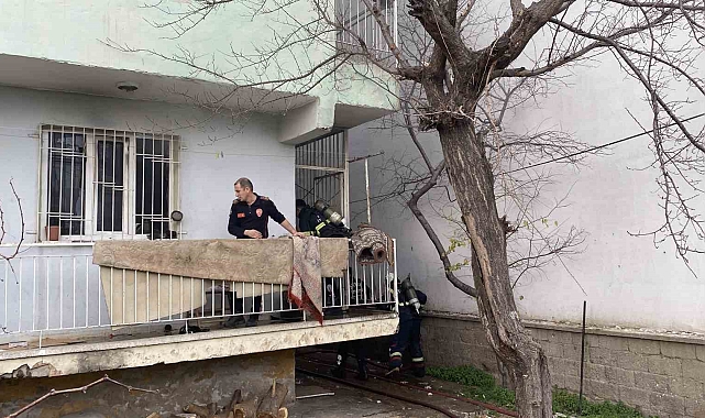 Kucağında yangından kurtardığı can dostları ile gözyaşlarına boğuldu