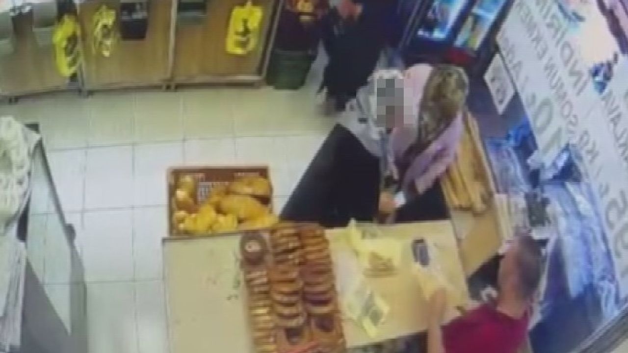 Dikkati dağılan kadının cüzdanını kaşla göz arasında çaldı